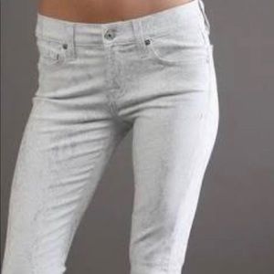 White silver metallic stretch jeans.
